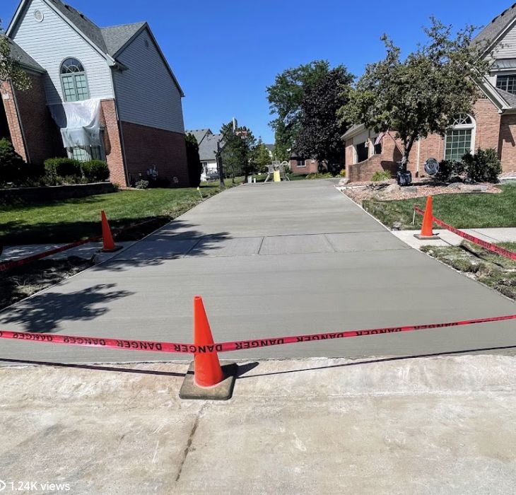 Freshly finished residential concrete driveway